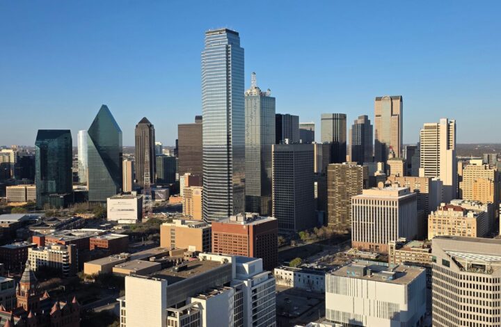 Downtown Dallas skyline under a clear blue sky